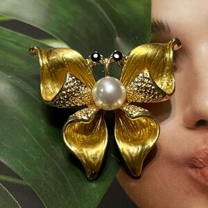 Elegant Gold Tone Butterfly Brooch with Pearl Accent